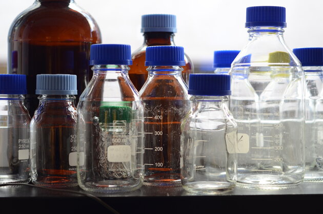 Medical bottles on a shelf.